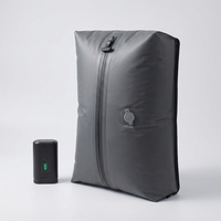 FlyPacked compression travel bag with USB air pump - studio hero shot