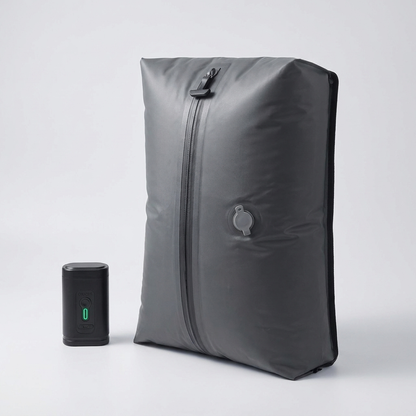 FlyPacked compression travel bag with USB air pump - studio hero shot